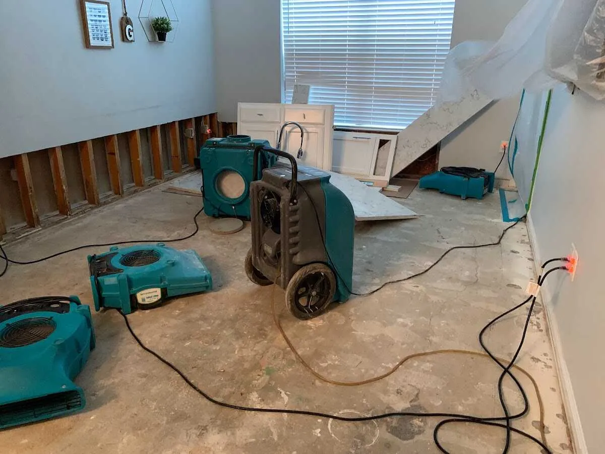 Dehumidifier in flood-cut room for Water Damage Restoration in Somerset